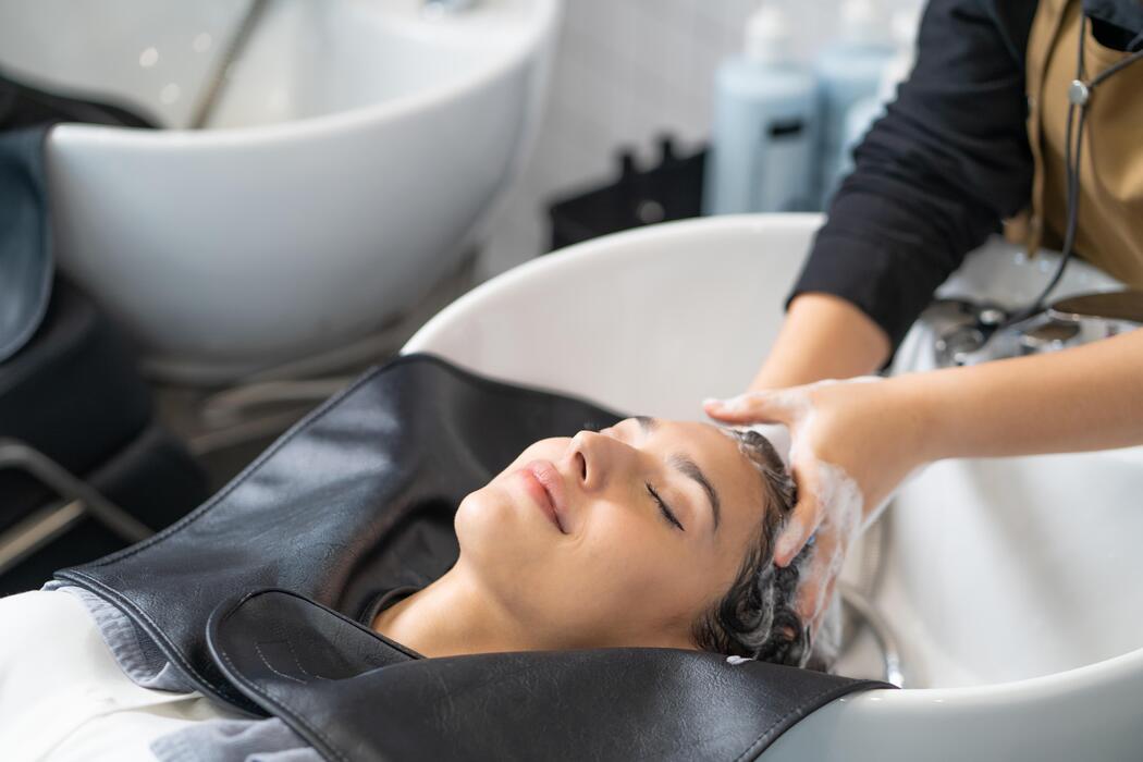 Hair washing service at the basin